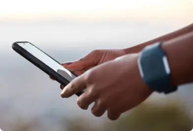 hands holding smartphone